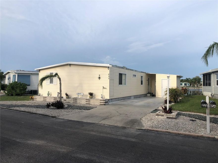 Do not miss this rare lakefront home in Venice Isle, the premier resident owned “over 55” Mobile home Park in Venice. This home features an open floor plan with 2 beautiful Florida rooms, both overlooking our lake.  Fully furnished, ready to move right in. Features include 2 newly renovated bathrooms, utility shed with washer /dryer, newer carpeting in  living room, new subflooring throughout home.  A roofer has been contracted and scheduled to install the carport in December (deposit paid with a remaining balance of $5700), 

There are close to 1000 homes on Venice Isle with the most active residents. Relax, enjoy  and make yourself at home.  There is always something for you to do.  The Park has many amenities for you to enjoy. Come visit our 2 clubhouses.The Park boasts 2 tennis courts, a fitness center, 2 heated pools, 2 hot tubs, saunas, putting greens, shuffleboard, Bocce ball, miniature golf, art rooms, pool room, TV lounges, card rooms, library, horseshoes, ceramic kilns, 2 huge ballrooms. We have many Park gatherings, and first rate shows on site. Sunday services and much more! Priced to sell!