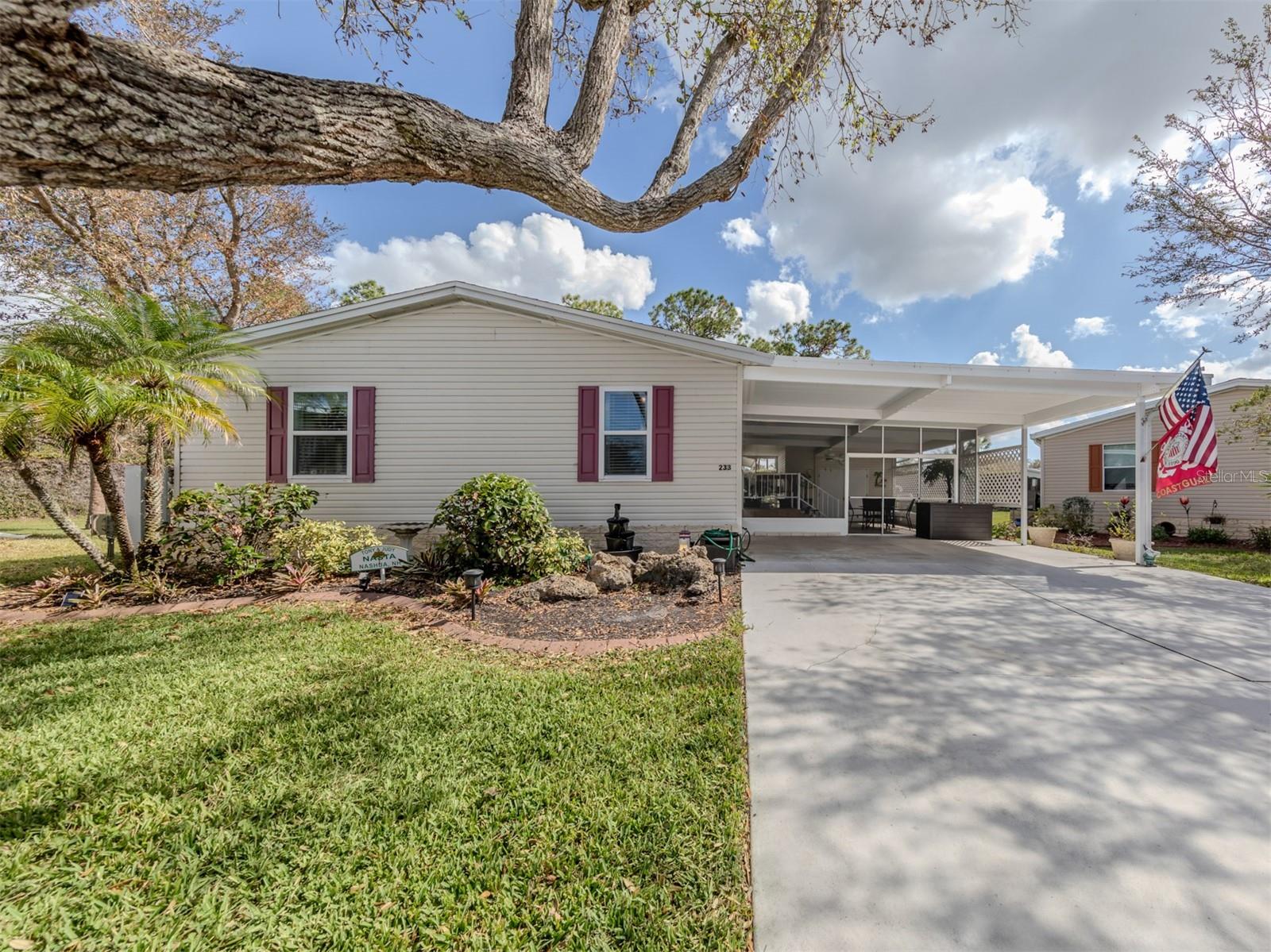 Nestled on a quiet cul-de-sac in the picturesque community of Riverwalk, this charming 2000 Palm Harbor manufactured home offers a perfect blend of indoor comfort and outdoor serenity. The home boasts a generous amount of outdoor space, including a large screened porch and a beautiful Florida room with AC and acrylic windows that overlooks the tranquil backyard, ensuring a private oasis with no neighbors behind. Inside, you'll find a well-designed 3-bedroom split floor plan with a spacious eat-in kitchen that is bathed in natural light. Laminate floors flow throughout the home, adding to its warm and welcoming feel. In addition, the guest bathroom features an updated shower, and there’s ample storage in the huge, air-conditioned shed. Recent updates add to this home's value and appeal: new windows in 2022, a roof replacement in 2022, a new AC in 2020, a hot water heater in 2023, and releveling with a new vapor barrier post-Hurricane Ian. This well-maintained home is a must-see for those seeking comfort, privacy, and a true Florida lifestyle. The Village at Riverwalk is a charming, waterfront community known for its serene atmosphere and lush natural beauty. Located along the scenic Myakka River, this gated neighborhood offers an active lifestyle with a wide range of amenities and outdoor activities. Residents enjoy access to walking trails that wind through mature landscaping, providing beautiful nature views and a peaceful retreat. A highlight of the community is its private kayak launch, offering easy river access for paddling and exploring the area’s tranquil waterways. The Village at Riverwalk also features a clubhouse with various social and recreational events, a heated pool, fitness facilities, and a library, making it an ideal place for both relaxation and engagement with neighbors. With its welcoming atmosphere and a blend of amenities that celebrate the Florida lifestyle, the Village at Riverwalk is a unique and appealing choice for those seeking community and natural beauty.