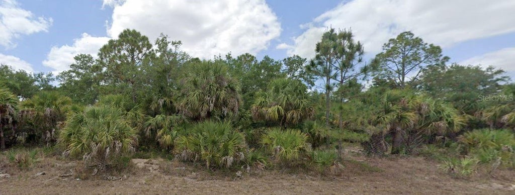 Photo of 3295 Como Street, Port Charlotte, FL 33948 (MLS # OM733225)