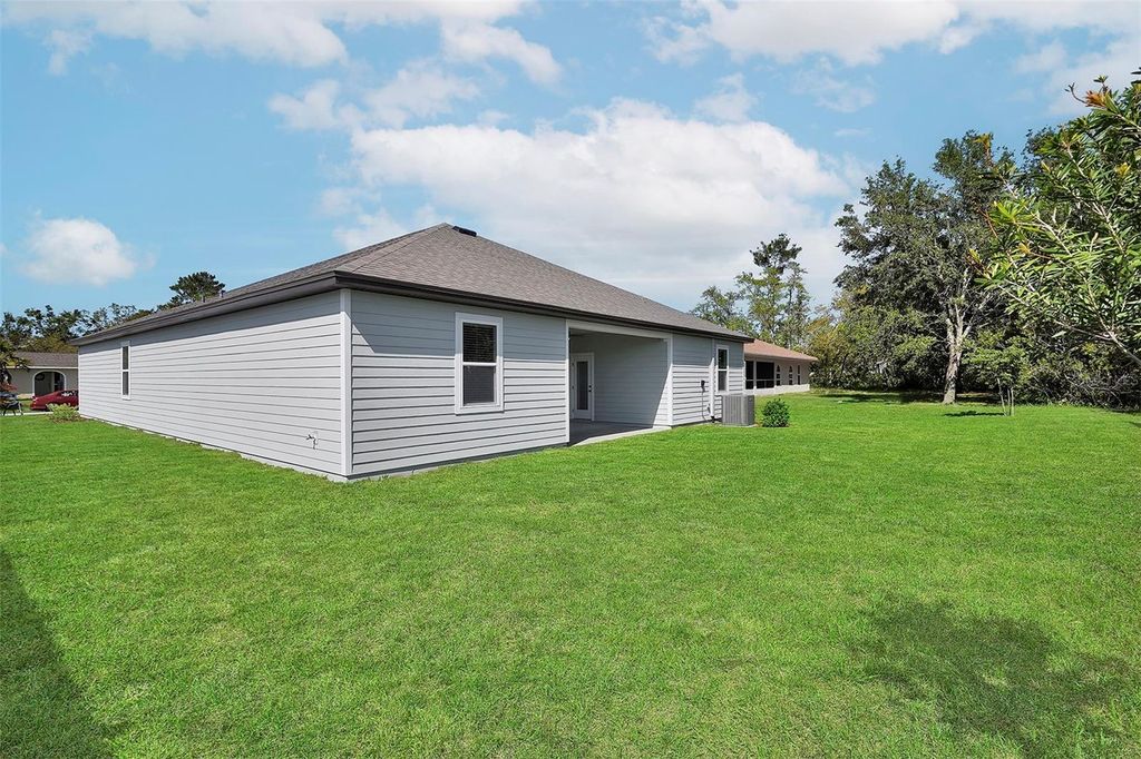 Photo of 2 Fifer Lane, Palm Coast, FL 32137 (MLS # TB8421989)