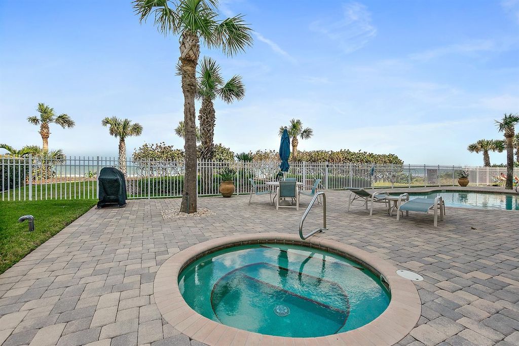 Photo of 711 S Atlantic Avenue #Unit 202, New Smyrna Beach, FL 32169 (MLS # O6369661)
