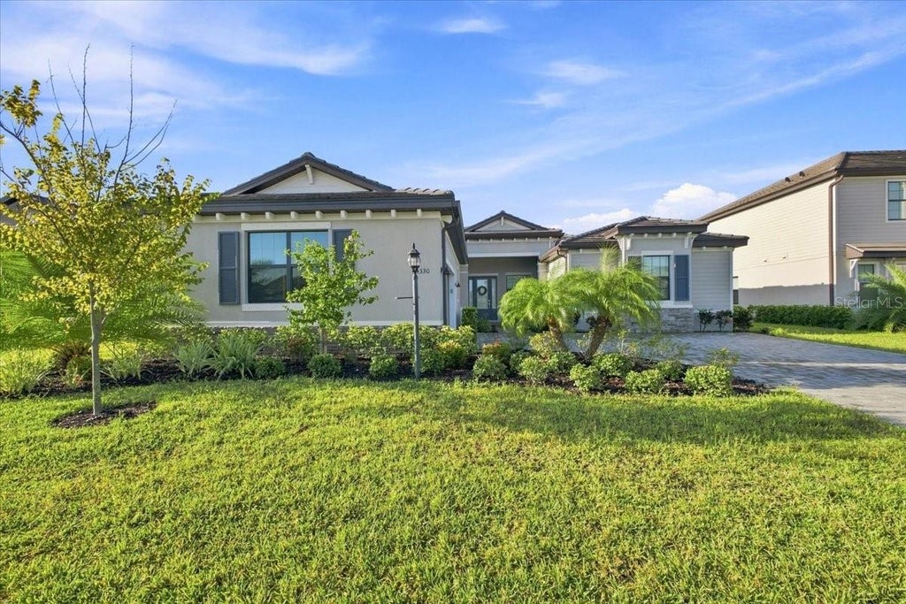 Photo of 15330 Golden Beam Place, Bradenton, FL 34211 (MLS # O6438850)