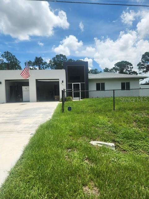 Beautiful construction located in Lehigh Acres area of Florida, 4 bedrooms and 2 and 1/2 bathrooms. Enjoy the convenience and security of an electric gate garage with space for two vehicles, along with additional terrace spaces. The kitchen are equipped with granite countertops, stainless steel appliances, and cabinets. Patio, ideal for entertaining. Benefit from the added peace of mind provided by impact windows. Offering protection from the elements and enhancing energy efficiency. With no association fees, this property are an attractive option for first-time homebuyers or investors. Fence.