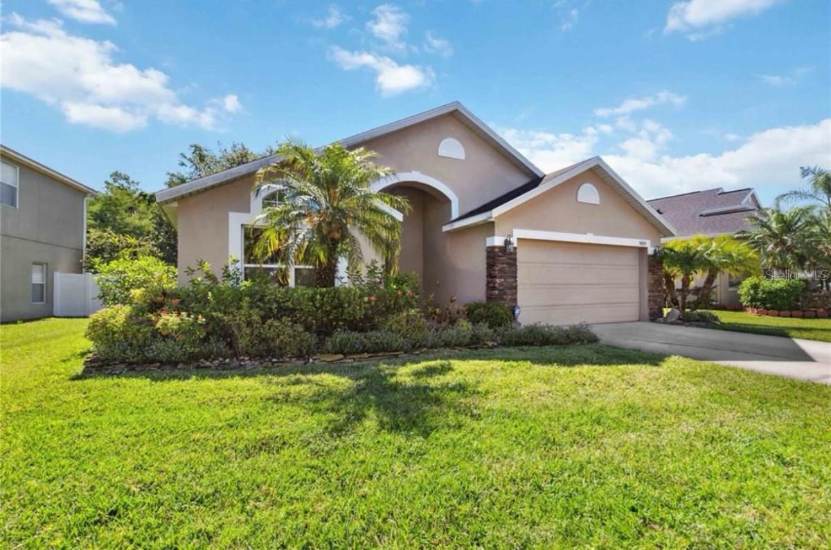 Welcome to this well-maintained 3-bedroom, 2-bathroom single-family home located in the highly desirable Meadow Pointe community of Wesley Chapel. This home features an open floor plan with tile flooring in main areas, a spacious living and dining area, and a fully equipped kitchen. The master suite includes a walk-in closet and a private bath. Enjoy a screened-in lanai overlooking a fenced backyard, perfect for relaxing or entertaining. Located in a quiet neighborhood with access to community amenities such as a pool, clubhouse, playground, and tennis courts. Zoned for top-rated schools and conveniently located near Wiregrass Mall, Tampa Premium Outlets, restaurants, and major highways. Lawn care is included. No pets preferred.