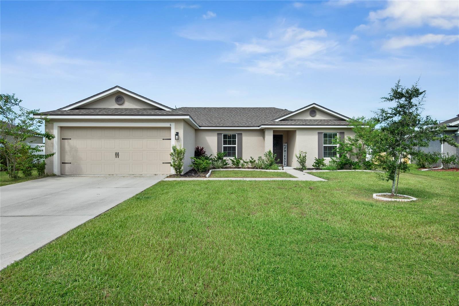 Welcome to this beautifully maintained 2022-built LGI Caladesi model home, located in the desirable Palm Harbor community of Palm Coast, Florida. Situated on a rare oversized 0.35-acre interior lot, this modern 3-bedroom, 2-bathroom concrete-block home offers the perfect combination of efficiency, comfort, and convenience.
Step inside to find 1,468 square feet of well-designed living space, highlighted by energy-efficient upgrades throughout. The open-concept layout seamlessly connects the living, dining, and kitchen areas—perfect for everyday living and entertaining. A programmable Honeywell touchscreen thermostat allows personalized comfort settings for every day of the week.
Every appliance in the home is energy-efficient, helping you save on utilities, and the house is equipped with double-pane Low-E windows, which reduce heat gain and improve insulation. ENERGY STAR-rated LED flush mount lighting enhances every room with long-lasting, eco-friendly illumination.
The spacious backyard is fully fenced and features a patio, offering a private outdoor oasis with plenty of room for gardening, play, or future expansion. You'll also enjoy a two-car garage and an extended four-car driveway, providing ample parking for family and guests.
Located just minutes from the newly renovated James F. Holland Park, with splash pad and dog park, and close to European Village, shopping, dining, and A+ rated schools. You're also within a short drive of Hammock Beach Resort, Varn Park, Malacompra Beach, and the stunning Washington Oaks State Park.
This turnkey, move-in-ready home is nestled on a quiet interior lot in a prime location—ideal for families, retirees, or anyone seeking modern comfort with low-maintenance living in a thriving coastal community.