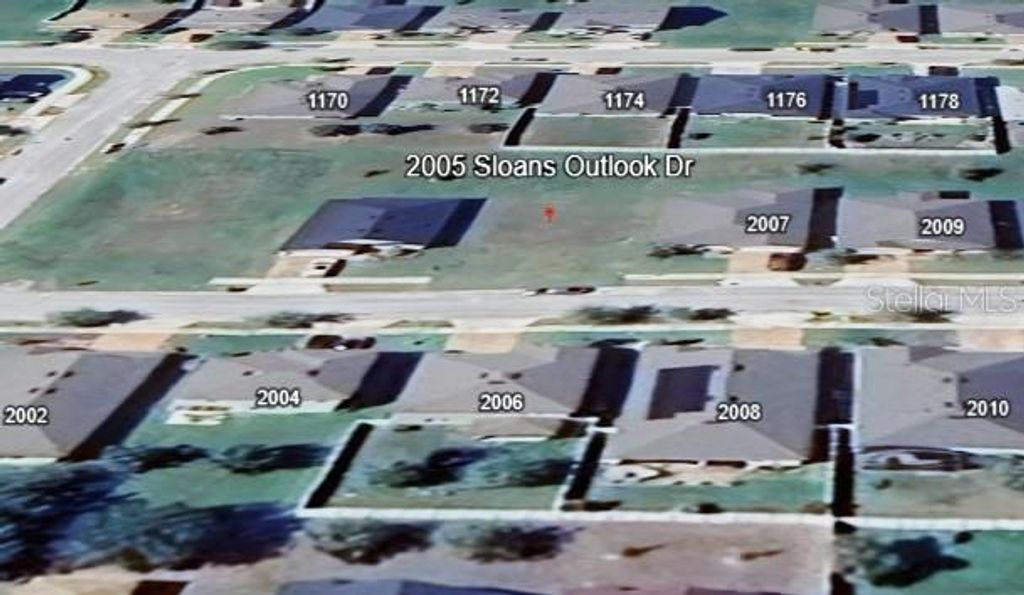 Photo of 2005 Sloans Outlook Drive, Groveland, FL 34736 (MLS # O6378807)