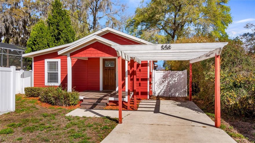 Historic downtown Clermont bungalow near the lakefront. Welcome to 558 W Minneola Ave., a charming 1920 historic bungalow in the heart of downtown Clermont. Just one block from vibrant Montrose Street, home of Clermont's beloved Sunday farmers market, local shops and restaurants, and only one block from award-winning Clermont Waterfront Park and Lake Minneola, this home offers the rare opportunity to live in one of the accessible and desirable areas in the city. From the moment you arrive, the inviting front porch sets the tone for this classic Florida bungalow. Inside, you'll find a light-filled two-bedroom, one-bath home with over 1,300 square feet of living space, featuring beautiful original hardwood floors, a spacious living room, and timeless architectural character that reflects Clermont’s early history. The updated kitchen connects to a bright dining area, creating a comfortable and functional layout for everyday living. Additional highlights include indoor laundry, a long driveway with ample parking, and a fully fenced backyard ideal for pets, gardening or entertaining. Recent improvements provide peace of mind, including a new roof and new water heater, while the concrete Hardie board siding offers durability and low-maintenance living. Whether you're looking for a primary residence, weekend retreat or investment property, this adorable bungalow delivers historic charm combined with an unbeatable location near the best of downtown Clermont. Go to the lake, farmers market, restaurants and trails, the Clermont lifestyle starts here.