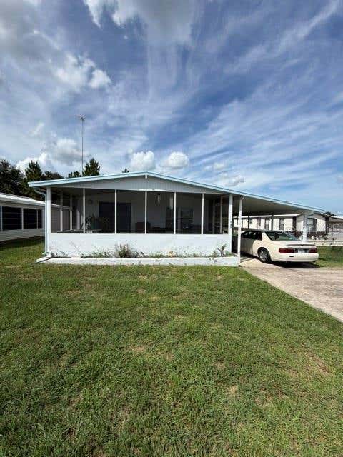 Photo of 125 Edgewood Boulevard, Lake Wales, FL 33898 (MLS # S5155450)
