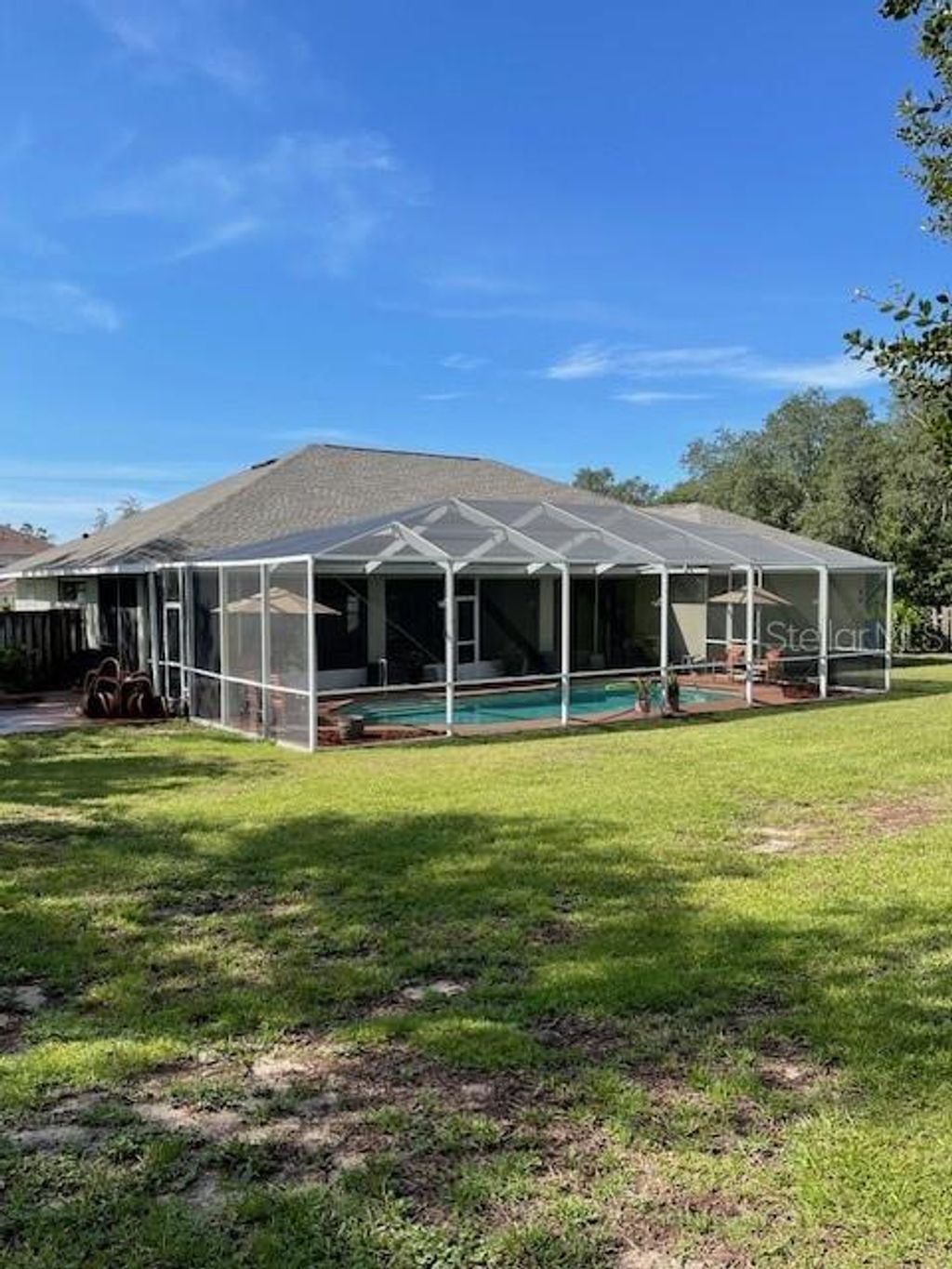 Photo of 4493 SW 102nd Lane Road, Ocala, FL 34476 (MLS # OM707571)