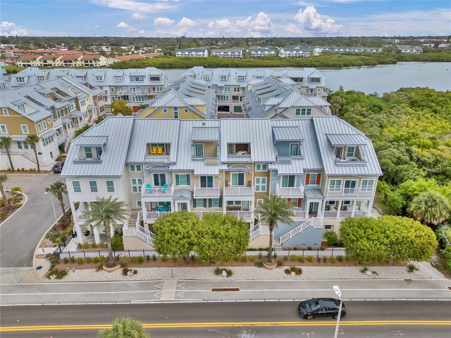 Understated Elegance in Waterside Community, Indian Shores!
Discover luxury living in this beautifully appointed and perfectly designed four-story townhome. Waterside is a community of townhomes ideally located just steps from the beach and the Intracoastal, offering a community dock and enabling you to enjoy all the watersports you can think of.  With 4 bedrooms, 3.5 baths, and 2,300 square feet, this home perfectly blends comfort and elegance with beach living at its very best.  The second floor is a light and bright gathering place, featuring a stunning living area with a large front porch that is joined by the kitchen, an eating area, a powder room, and one of the balconies, perfect for enjoying morning coffee or a meal.
Any chef will love the luxury kitchen that includes upgraded appliances, solid wood cabinetry, gas stove cooking, and a massive island finished in leathered granite.  Moving on up to the third floor is dedicated to a luxurious primary suite, featuring an en-suite bath with dual sinks, an oversized shower, and a spacious walk-in closet, and of course, a private balcony with views of the blue-green gulf.  This floor also houses additional guest rooms and a beautifully designed full bath. For ease, the laundry room is also on this floor.  Take the stairs or save your knees and use the private elevator to the fourth floor to find a huge bedroom, a bonus room, a playroom office, or whatever you can dream of. This level has a full bath and a gorgeous balcony for a view of magnificent sunsets.  The home features 10-foot ceilings on the second floor and 9-foot ceilings on the other floors, with upgraded tile on the main floor and beautiful wood floors on the third and fourth floors. Additional highlights include a three-car garage with extra storage and a high ceiling.  A tankless water heater, full-house filtration system, and custom closets are a few of the extras included to make life a little bit easier.  If you are not at the beach or enjoying watersports, meet your neighbors at the sparkling pool with grilling area, situated in the middle of the community, just steps from your home. The property also welcomes your four-legged family members and is just minutes from Clearwater/St. Pete dining, nightlife, and shopping. 30 minutes to Clearwater/ St Petersburg airport and 40 minutes to Tampa International.  Whether you want to be on the go or just relax your way, you can! What more can you ask for? It is all here. Don’t miss the opportunity to own this slice of paradise in the sought-after Waterside community!