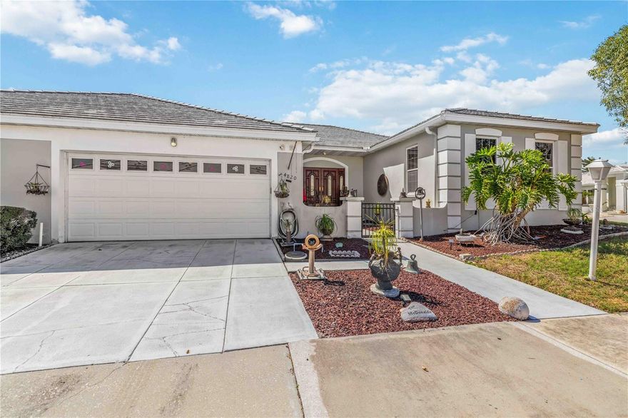 Welcome to this stunning Bradenton condo where space, style, and location converge beautifully. From the moment you step through the grand entrance and its gorgeous front door, you'll feel the warmth of a home designed for living well.

Inside, vaulted ceilings crown the main living area, flooding the space with natural light and creating an airy, open atmosphere. A charming wood-burning fireplace anchors the room, perfect for cozy evenings. The showpiece of this home is the expansive 19'x16'Florida room off the master suite, complete with its own mini-split system and private access to the recently resurfaced pool — your personal retreat for year-round relaxation.

Smart upgrades elevate this property above the rest. Hurricane-impact windows deliver peace of mind during storm season, while a brand-new AC system with a dual-speed compressor keeps energy costs in check without sacrificing comfort. 

The neighborhood truly sets this home apart. Located just minutes from the world-renowned IMG Academy, you're surrounded by an athletic and vibrant community. Bayshore Gardens Park offers green space and recreation nearby, while Publix at Bradenton Commons handles everyday conveniences. When the weekend calls for sand and surf, the beautiful shores of Bradenton Beach are a short drive west.

This is coastal Florida living with substance — generous square footage, thoughtful upgrades, and a location that puts everything within easy reach. Schedule your private showing today before this one slips away.