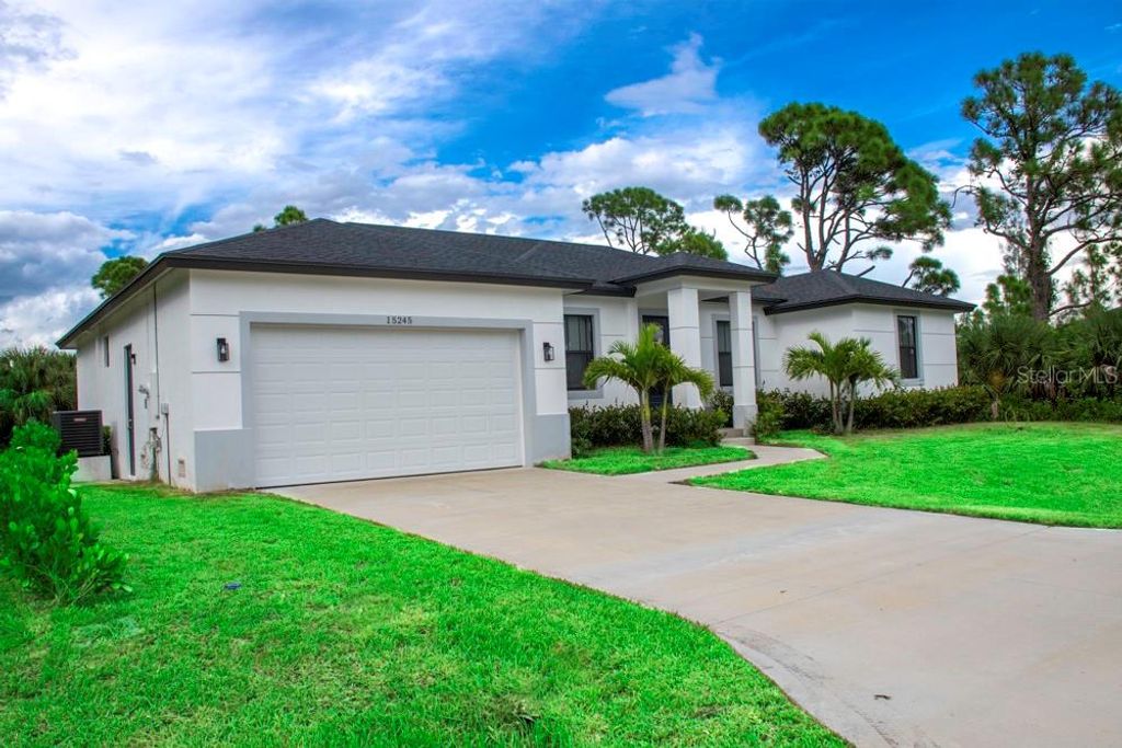 Photo of 15245 Brainbridge Circle, Port Charlotte, FL 33981 (MLS # O6338019)