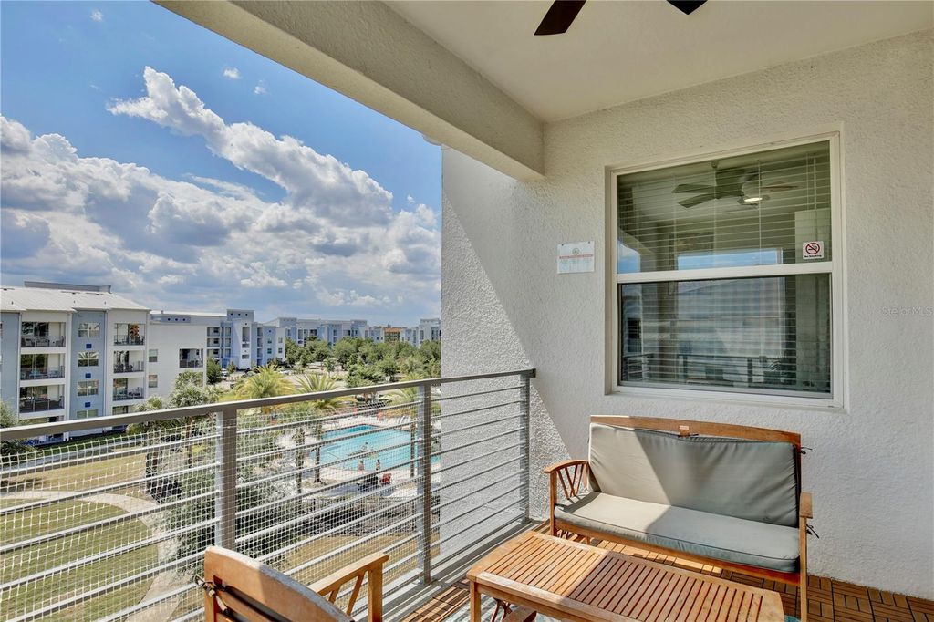 Photo of 3180 Paradox Circle #402, Kissimmee, FL 34746 (MLS # O6401403)