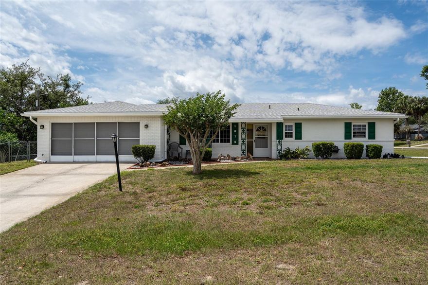 Welcome home to this beautifully maintained 2-bedroom, 2-bath residence situated on a desirable corner lot in a centrally located neighborhood close to shopping, dining, schools, and major roadways. This move-in ready home offers comfort, convenience, and valuable updates throughout. Step inside to find a bright and inviting layout featuring tinted windows that help improve energy efficiency and keep the home cooler year-round. Enjoy additional living space in the enclosed porch, perfect for relaxing, entertaining, or enjoying your morning coffee.  Outside, the fenced yard provides plenty of room for pets, gardening, or outdoor gatherings, while the spacious 2-car garage offers ample storage and parking. Major improvements give peace of mind, including a new roof installed in 2023, a brand-new A/C system with new ductwork completed in 2025, and new gutters. With all the big-ticket items already updated, this home is truly ready for its next owner.  Don’t miss this opportunity to own a well-cared-for home in a fantastic central location!