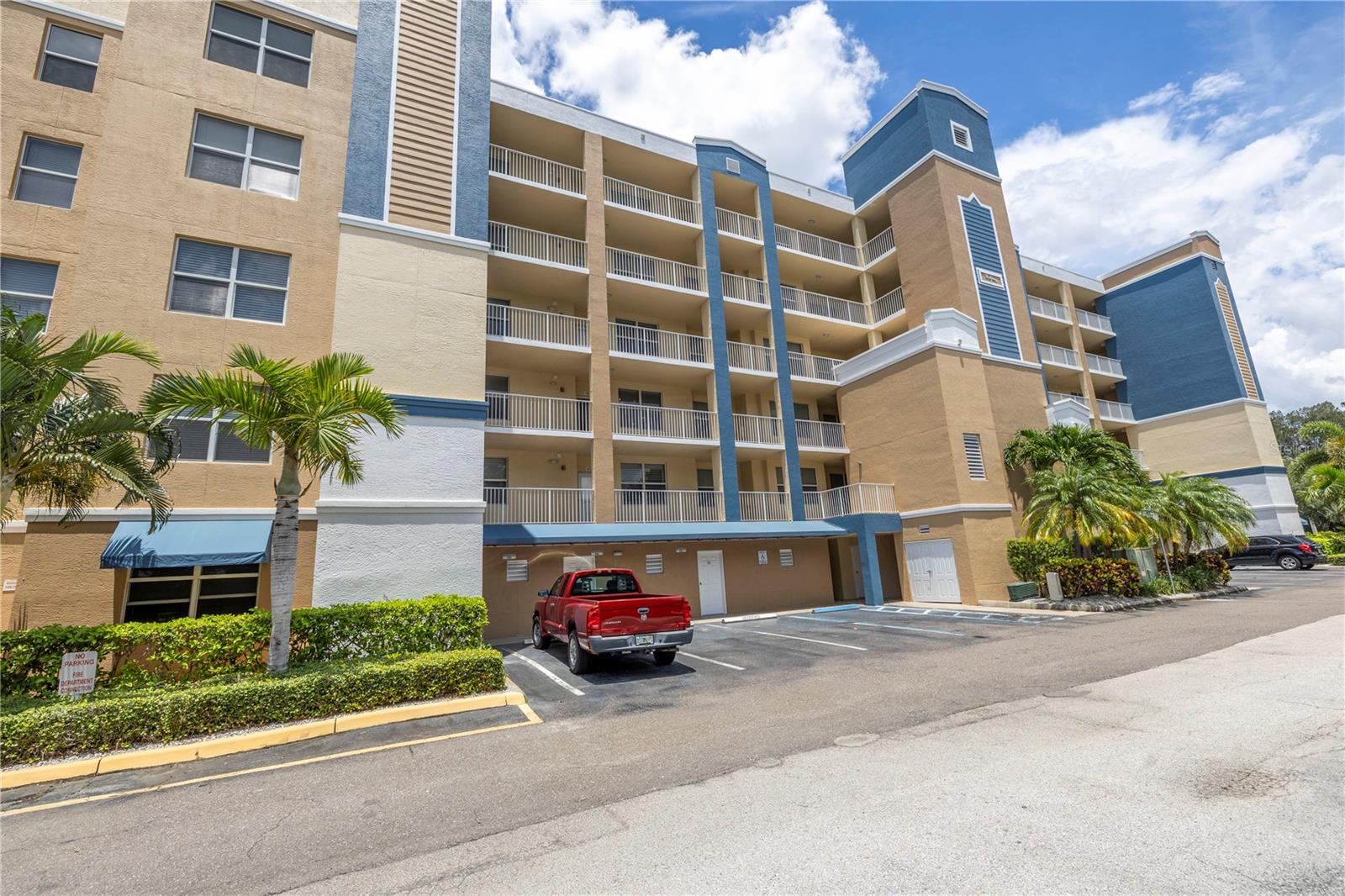 This beautiful 2 Bedroom, 2 full bath condo with a large eat in kitchen, and high ceilings, is only a 3-minute walk to the golf course and pools. The water view from the living room, primary bedroom and balcony allows owners a peaceful, quiet and in a wildlife setting. The huge primary bedroom also has a large bathroom, large shower, dual sinks, his and her walk-in closets and a walk out balcony. The condo has new carpet (July 2024) new paint, new ceiling fans, all new modern electrical switches and outlets, all new faucets and shut offs for water supplies throughout and new hot water tank (July 2024). The complex not only sits on a golf course, it has 2 large pools, one that is heated with a jacuzzi and a club house with a full kitchen and meeting room. This property is built out of solid cement, has sprinklers throughout, private elevator for each building (secure for only owners with key usage). This property is maintained and managed to the highest quality. HOA fees cover everything including cable TV, High Speed Internet, trash, sewer, water, and maintenance of property and pools. Electric is only thing not covered. The building was totally repainted in the summer of 2023. Centrally located, close to airports, 3 different malls, grocery stores, restaurants, churches and 15 minutes to the beach! It is move in ready.