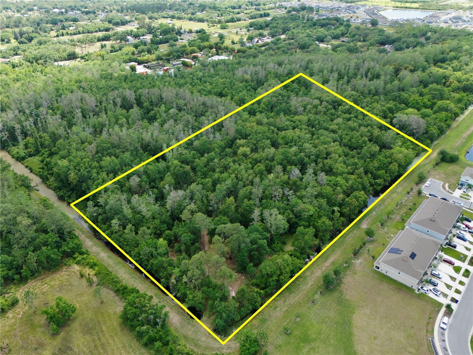 Prime land available on Hickory Tree Road in St. Cloud, FL 34772—ideally located in one of Central Florida’s fastest-growing areas and just a short drive from Lake Nona, a major hub for innovation, healthcare, and technology. This high-visibility corner lot is minutes from downtown St. Cloud, major retailers like Walmart and Publix, and surrounded by thriving residential communities. Zoned for agricultural use, the property offers many potential opportunities.