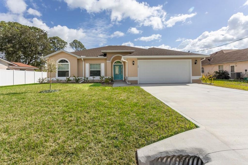 Photo of 10 Fischer Lane, Palm Coast, FL 32137 (MLS # FC316959)