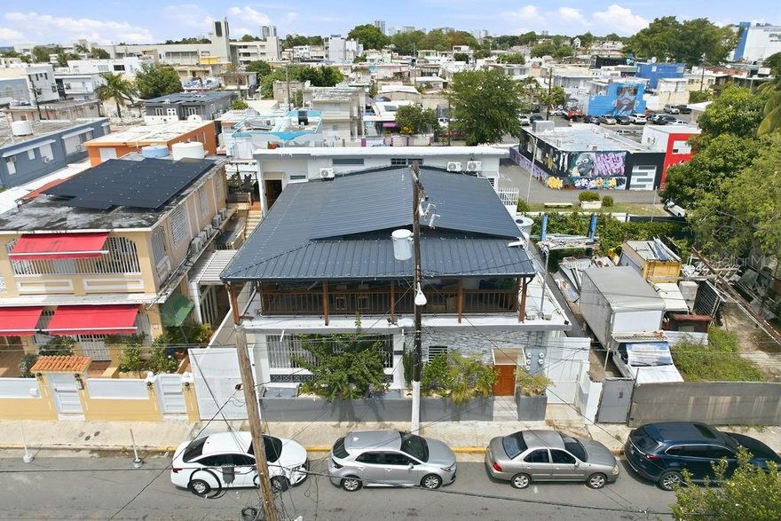 Income-producing 8-unit multifamily property in a prime Santurce location just steps from Calle Loíza. No HOA fees and no short-term rental restrictions, making this an exceptional investment opportunity in one of San Juan’s most vibrant rental markets.
The property consists of four 1-bedroom/1-bath units, two 2-bedroom/1-bath units, and two 3-bedroom/1-bath units, with 3,553 sqft of living area on a 286 sqm lot. Features include separate entrances, remodeled kitchens, split-unit A/Cs, balconies, laundry areas, water sister, portable backup power generator, and comes fully equipped for immediate operation.
Currently operated as a mix of short-term and long-term rentals, with 5 units active on STR platforms and 3 units leased long term. Property has a strong rental history and excellent income-producing potential.
Ideally located near beaches, restaurants, nightlife, hotels, parks, pharmacies, shops, and major attractions. Separate parking lot available.
Property is tenant occupied; showings by appointment only and scheduled between guest stays. Proof of funds required prior to showings. Contact listing agents Adriana Portilla and Claudia Rosario for additional information.