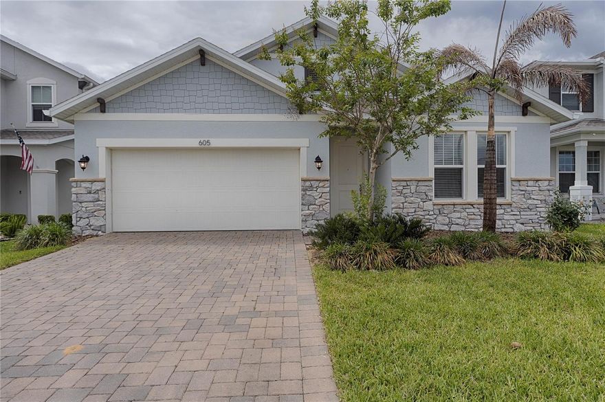 This Energy Star Certified home has 4 bedrooms, 2 baths, covered, screened-in lanai and a 2 car garage and fenced in yard. Sits on premium lot across from community pool and playground. Entertaining is a breeze with this open concept layout, including $47,000 in upgrades. Kitchen features 42" gray cabinets with crown molding, culinary choice Whirlpool appliances, solid surface counter-tops in kitchen and bathrooms, glass tile backsplash, and walk-in pantry. Beautiful wood-like tile flooring in the main areas. The spacious Primary Suite has a tray ceiling, walk-in closet, dual sink vanity, enlarged glass shower and privacy lavatory. Located minutes from FL Turnpike. Park View at the Hills, is next to a brand new Publix, Starbucks, and other amenities, including The Hancock Trail, minutes away. The information provided on the MLS is thought to be correct but not guaranteed.