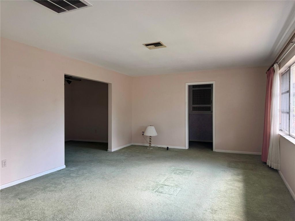 Photo of 677 Pinewood Drive, Dunedin, FL 34698 (MLS # TB8493797)