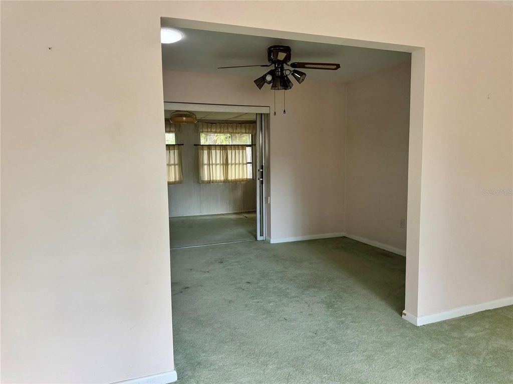 Photo of 677 Pinewood Drive, Dunedin, FL 34698 (MLS # TB8493797)