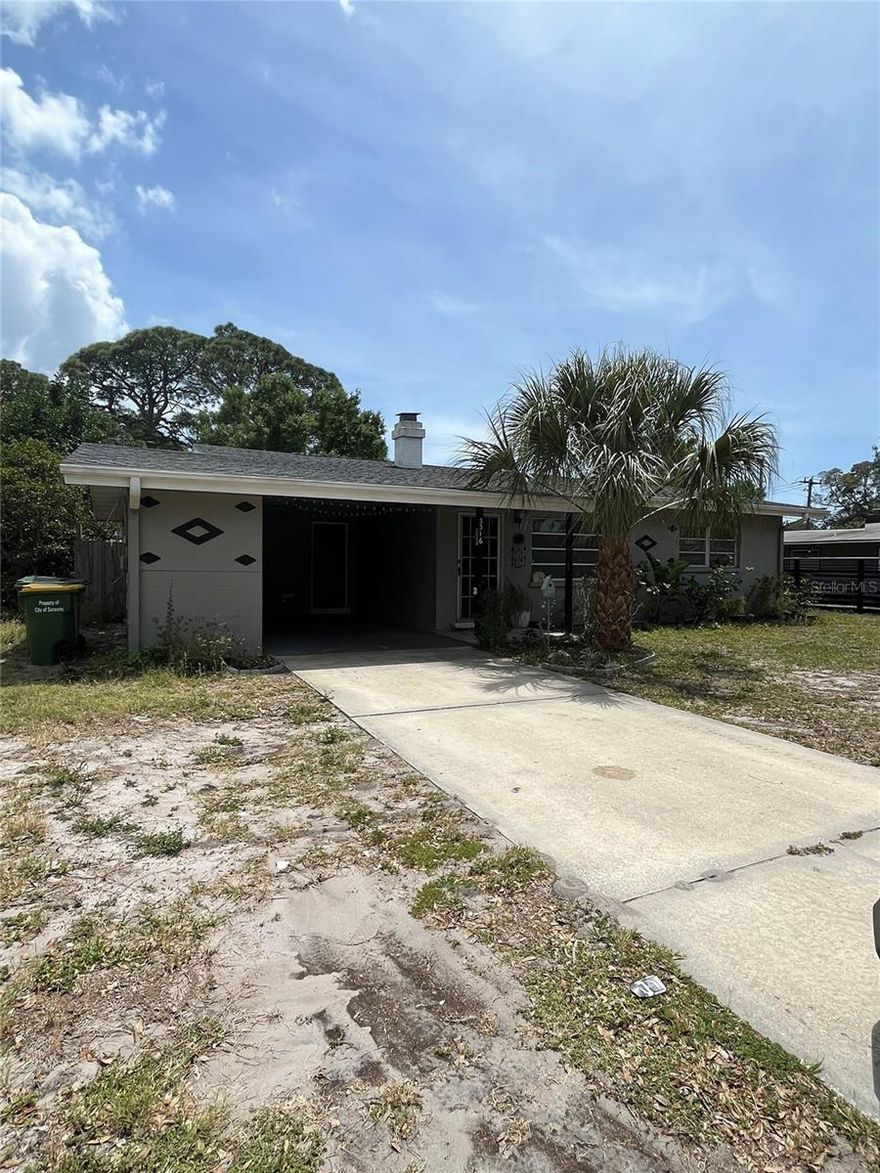 Location is everything for this home! Very close to downtown and easily accessible to all of central Sarasota. With a little work, the charm of this mid-century home will shine through. This is a great opportunity for an investment or a do-it-yourself project.