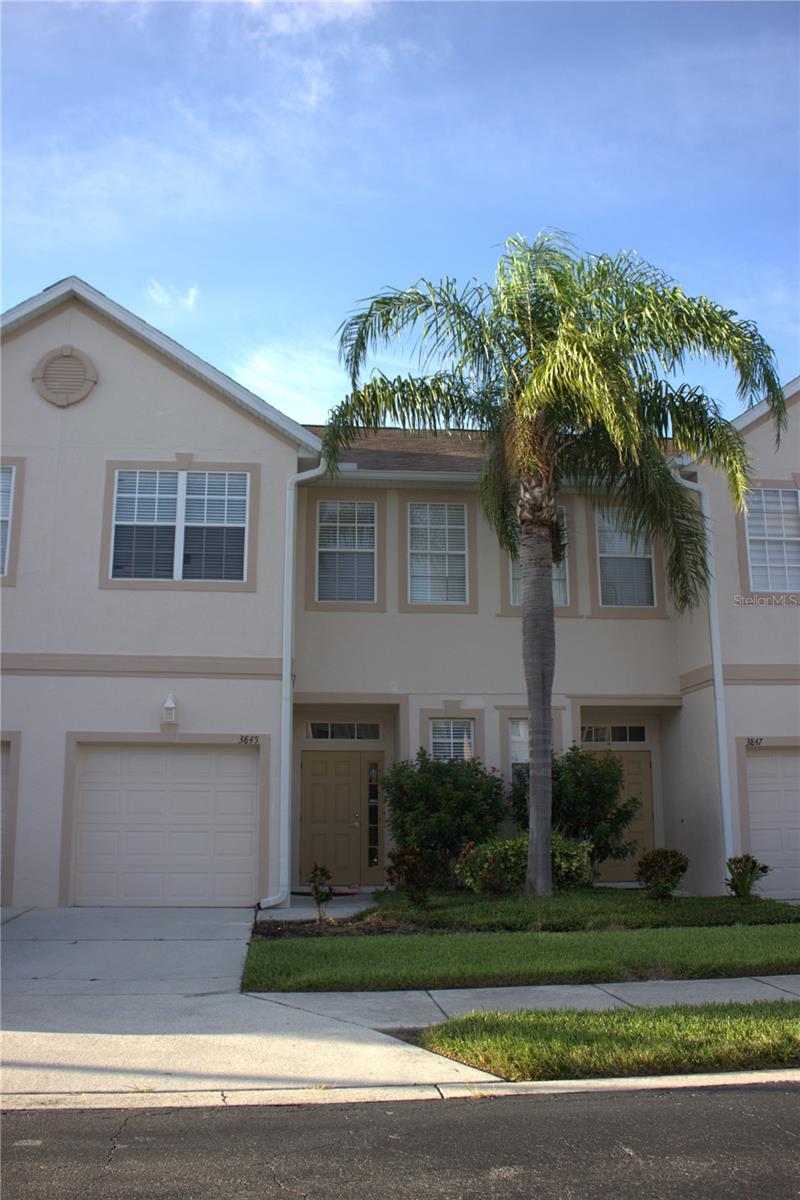 Welcome home to this move-in-ready townhome, located in the desirable, maintenance-free, gated community of Parkstone. Enjoy the fantastic amenities, including a pool and beautifully landscaped, park-like setting. This wonderful townhome features a 1-car garage and a spacious, open floor plan with high ceilings that create a bright and airy atmosphere. The home boasts ceramic floors and LVT throughout. The kitchen offers plenty of space, complete with a breakfast bar, pantry, and stainless-steel appliances. Relax and unwind on the lanai, perfect for outdoor enjoyment. Upstairs, you'll find 3 bedrooms, 2 baths, a laundry room, and ample closet space. A convenient half bath is located on the lower level. This townhome is ideally situated near The Legacy Trail, shopping, schools, restaurants, downtown Sarasota, UTC Mall, and the beach making it the perfect place to call home!