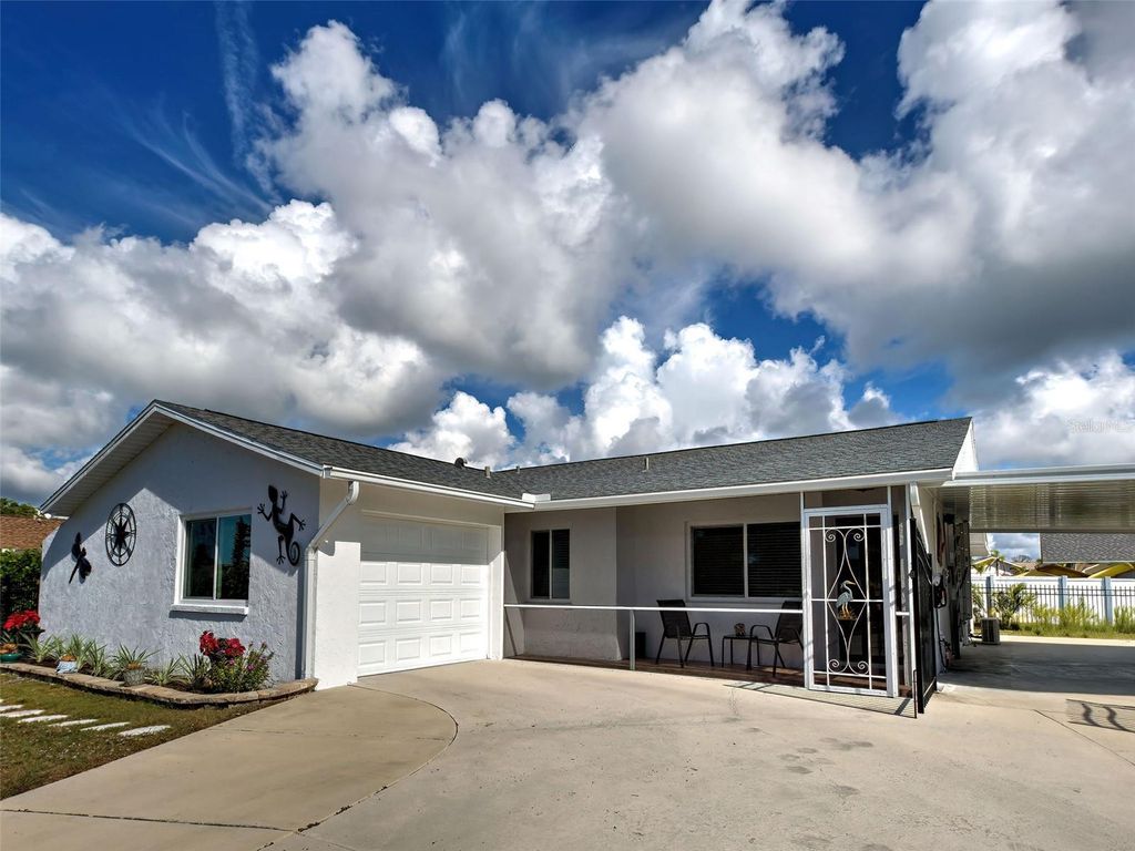 Photo of 6749 Gasparilla Pines Boulevard, Englewood, FL 34224 (MLS # D6145019)