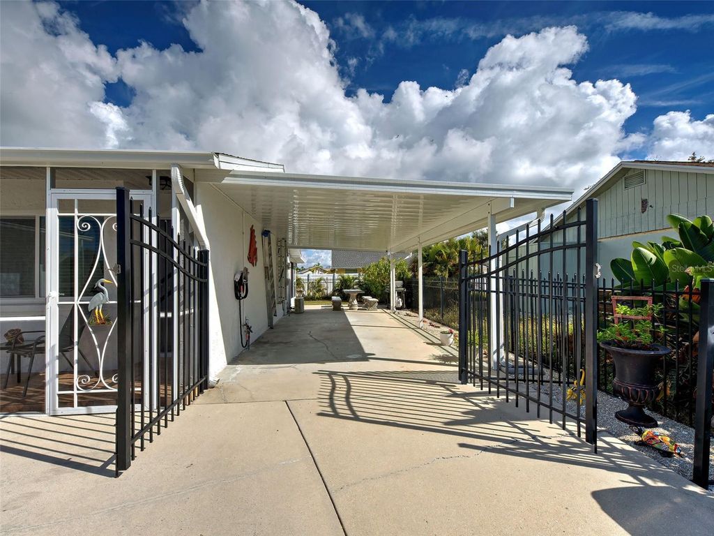 Photo of 6749 Gasparilla Pines Boulevard, Englewood, FL 34224 (MLS # D6145019)