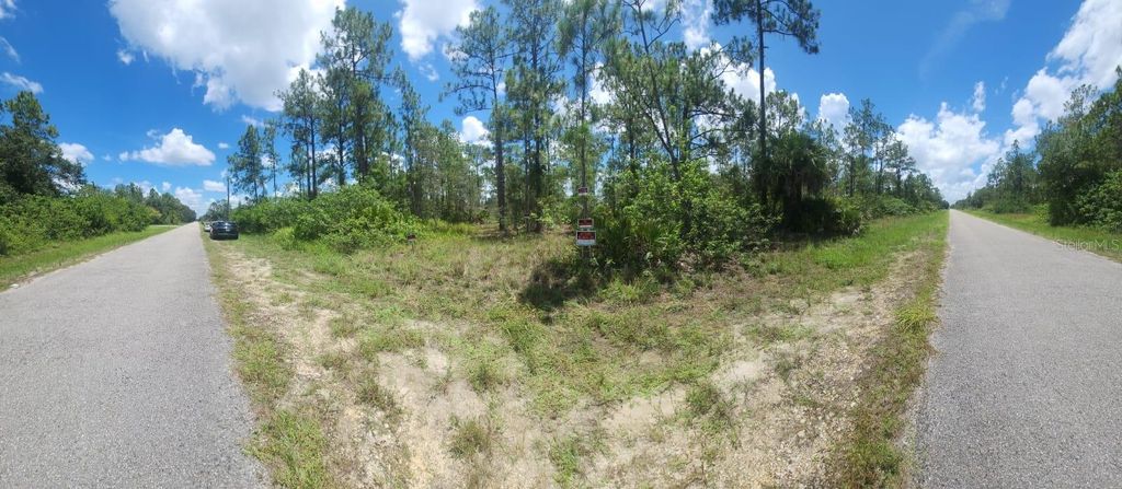 Photo of 1306 Jefferson Avenue, Lehigh Acres, FL 33972 (MLS # OM711694)