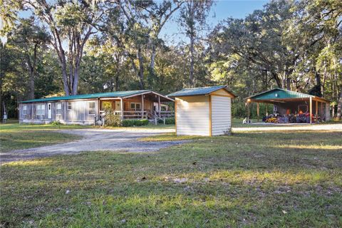 Photo of 782 NE 173rd Avenue, Old Town, FL 32680 (MLS # O6361406)