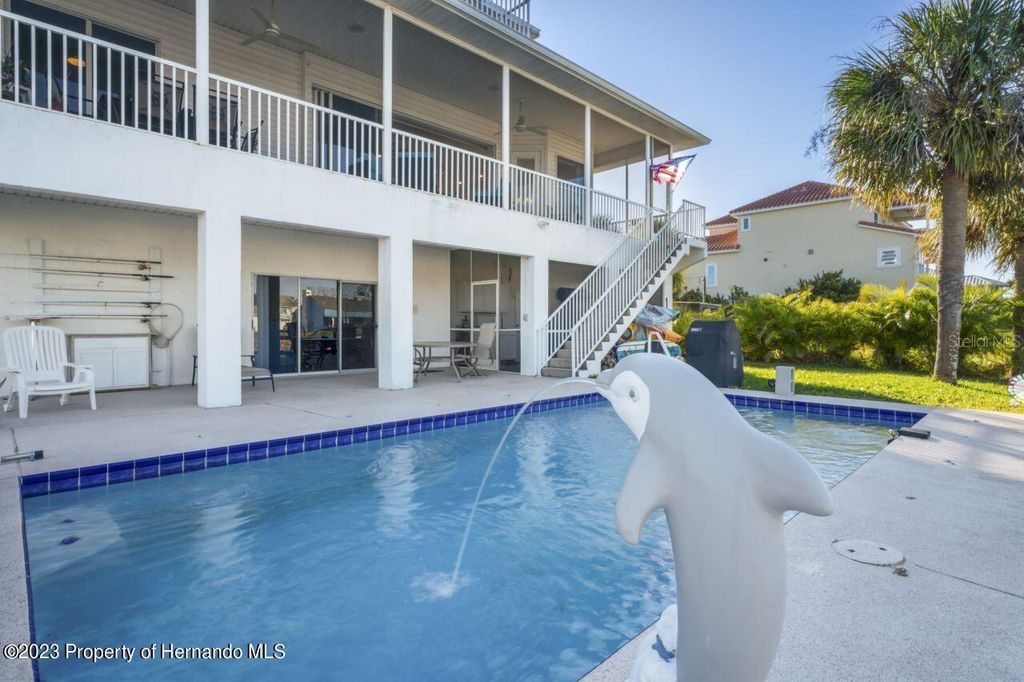 Photo of 3459 Flamingo Boulevard, Hernando Beach, FL 34607 (MLS # TB8446320)