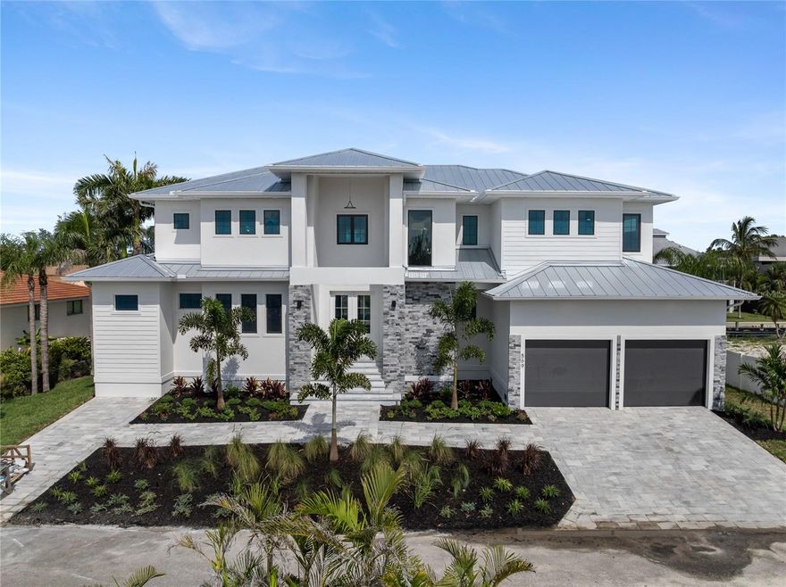 Under Construction. New Construction. Experience the pinnacle of waterfront luxury with this brand-new construction home in the heart of Longboat Key competitively priced and ready for its next owner. Situated on a private canal, this 4-bedroom plus den, 4,106 sqft residence offers the perfect blend of modern elegance and coastal charm. Designed for seamless indoor-outdoor living, the home features two lanais, a private pool with a spa, and an elevated foundation at 9.5 feet. Boating enthusiasts will appreciate the 10,000-lb boat dock and quick access to the Gulf of Mexico for endless days on the water. Inside, enjoy engineered hardwood flooring throughout, quartz countertops in every space, and a large walk-in pantry. The thoughtfully designed layout includes two laundry rooms for added convenience. Nestled in a quiet, private setting, yet just minutes from Longboat Key’s pristine beaches, golf courses, and fine dining, this home is a rare find. Don’t miss the chance to own a waterfront masterpiece in one of Florida’s most desirable locations.