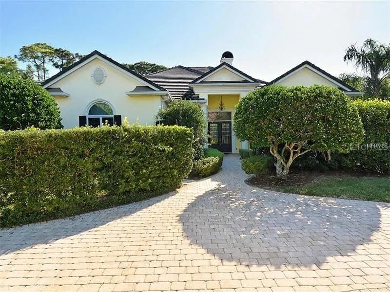 Large 4 bedroom, 4 bath home on over half an acre bordering the 7th fairway of the Heron Golf Course in the Oaks Clubside. Located in the heart of south Sarasota, The Oaks offers 2 championship golf courses, a world-class tennis facility, a state-of-the art wellness center and a wide variety of club amenities, including dining options and social offerings. Club membership is required with homeownership.