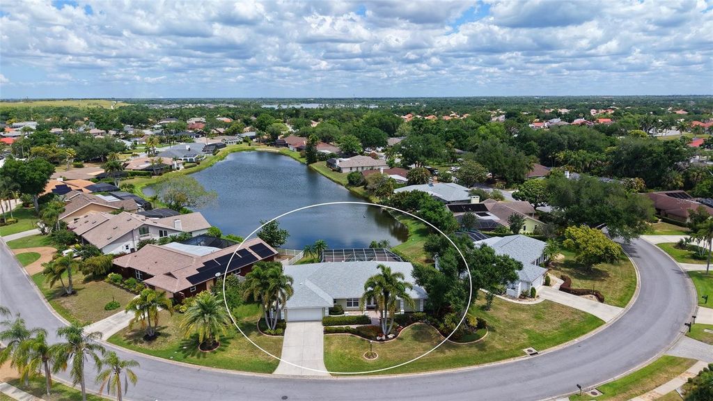 Photo of 6921 Country Lakes Circle, Sarasota, FL 34243 (MLS # A4691800)