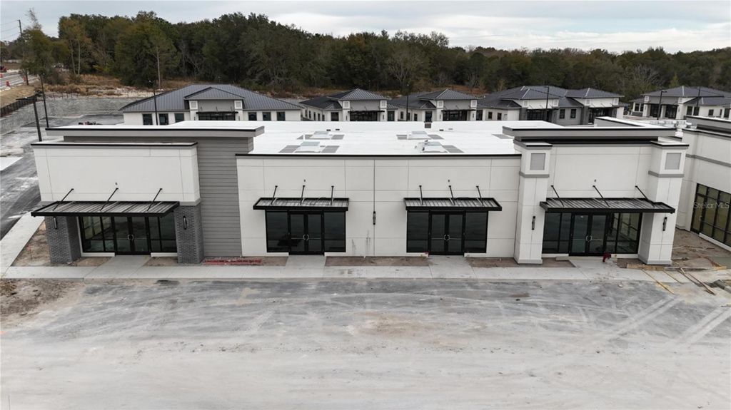 Photo of 2535 Ocoee Apopka Road #5, Apopka, FL 32703 (MLS # O6300768)