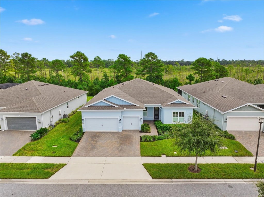 Photo of 2769 Cherry Blossom Loop, Saint Cloud, FL 34771 (MLS # O6448234)
