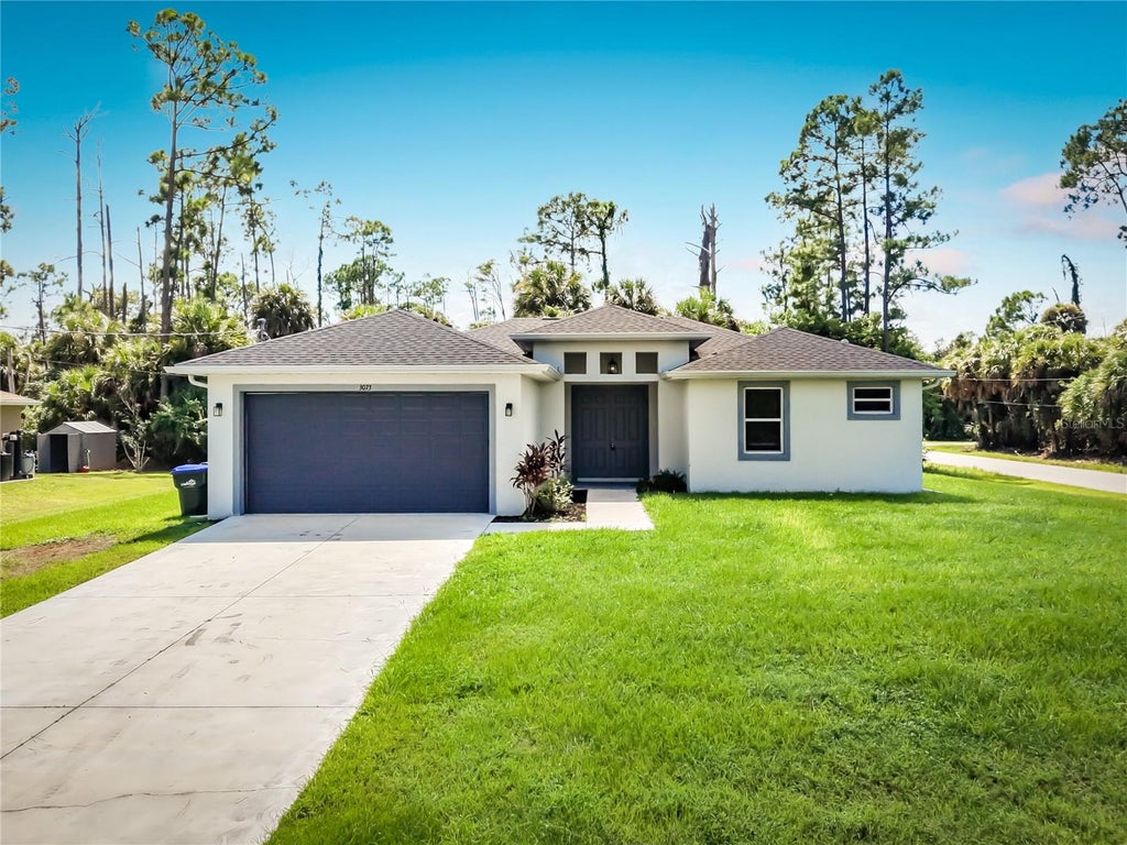 Photo of 3073 Tulsa Avenue, North Port, FL 34286 (MLS # C7531008)