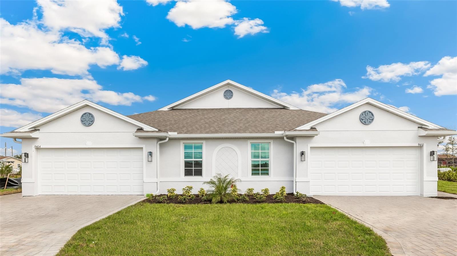 BIG PRICE CUT & MOVE-IN READY! Your shiny new home in Punta Gorda, FL is waiting for you! This brand-new villa has an awesome spot with a beautiful view of the lake, perfect for watching amazing sunsets every night. Inside, you'll find a roomy layout filled with cool features and high-quality finishes. Since it's on a corner lot next to community fun spots, you get both privacy and easy access to everything. When you walk into this Carrington plan home, you'll see a bright living room that connects to a fancy kitchen and a covered lanai where you can hang out. Picture having friends and family over in this stylish space, complete with quartz countertops, modern cabinets, shiny stainless steel appliances, a washer and dryer, and a kitchen island for quick meals. Your new home also has strong impact glass and smart technology to keep everything connected. This beautiful villa is in Sea Cove, Punta Gorda's newest community, mixing modern style with a beachy vibe, and it’s pet-friendly too! You’re just a few minutes away from shopping, dining, and fun activities. Whether you want to walk on the beach, visit Fisherman’s Village, fly from Punta Gorda Airport, or check out the cute downtown, this place has it all. Sea Cove is a gated community with a sparkling pool, a Bark Park for your pets, and a nice lawn for playing outside. We are the Ultimate Dog Friendly Community! Don’t miss your chance to own a slice of paradise in Punta Gorda’s coolest new villa community. Schedule a visit today and start living the beach life!