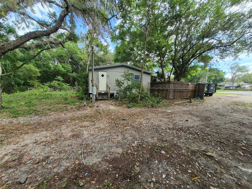 Photo of 9260 Lake Drive, New Port Richey, FL 34654 (MLS # TB8496375)