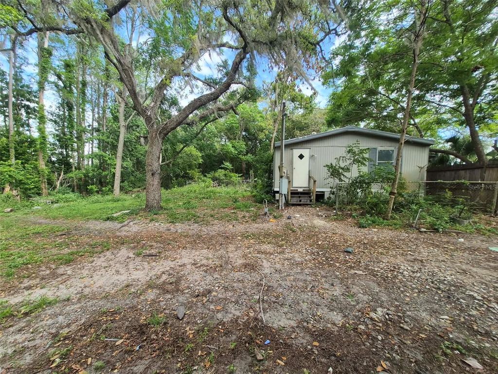 Photo of 9260 Lake Drive, New Port Richey, FL 34654 (MLS # TB8496375)