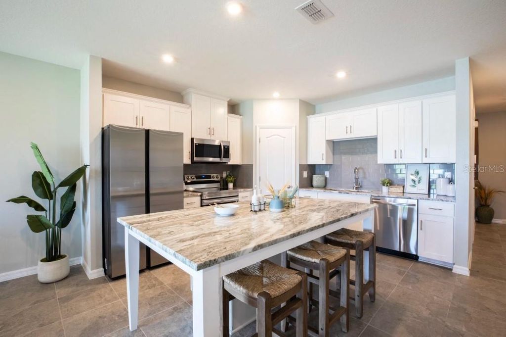 Photo of 10657 Ironwood Tree Way, San Antonio, FL 33576 (MLS # O6342900)