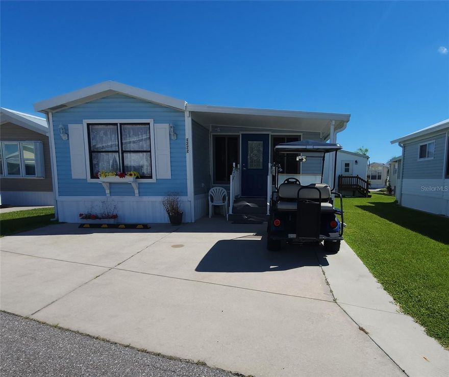 WELL KEPT ONE BED, TWO BATH MOBILE HOME IN ACTIVE 55+ COMMUNITY! This property features a newer addition added in 2023. The addition has a spacious living room and large full bathroom with laundry and an extra storage closet. The mobile home side has a gracious kitchen, dining room, another full bathroom, and a bedroom with plenty of built-in closet space. The living room has a handsome cabinet with a murphy bed for extra sleeping options. Central A/C (2022) and newer water heater. Sold for CASH ONLY. Sugar Creek Country Club has LOW HOA FEES OF $525 each QUARTER which include internet, cable, grass mowing, water, sewer and trash. There are 2 swimming pools, heated spa, clubhouse, tennis, pickleball, shuffleboard, a fitness room, and workshop. There is an active social calendar during the winter months. Enjoy this community's proximity to the River Links Golf Course and the Braden River. SO MUCH TO OFFER! Sorry this is not a dog lot.