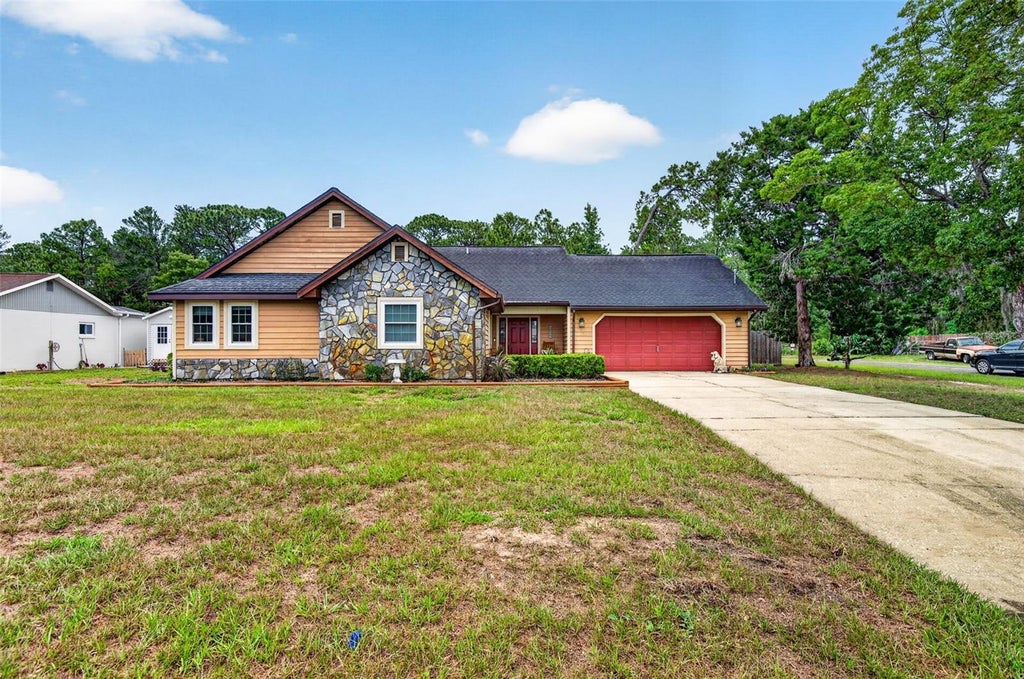 Photo of 11037 Gifford Dr, Spring Hill, FL 34608 (MLS # TB8523883)