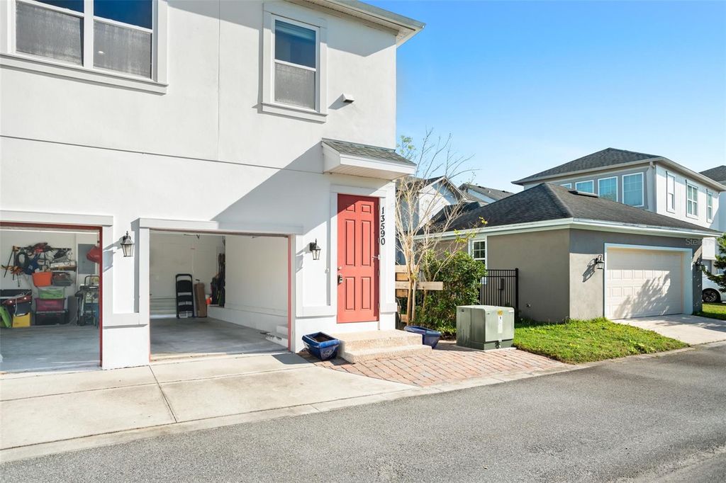 Photo of 13590 Lessing Avenue, Orlando, FL 32827 (MLS # O6378332)