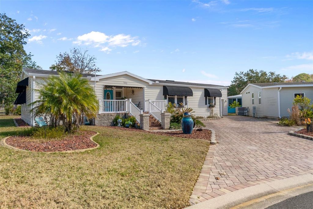 Photo of 102 Woody Court, Wildwood, FL 34785 (MLS # TB8469704)
