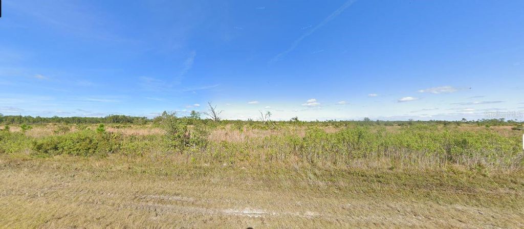 Photo of 518 Portulaca Drive, Indian Lake Estates, FL 33855 (MLS # O6229445)