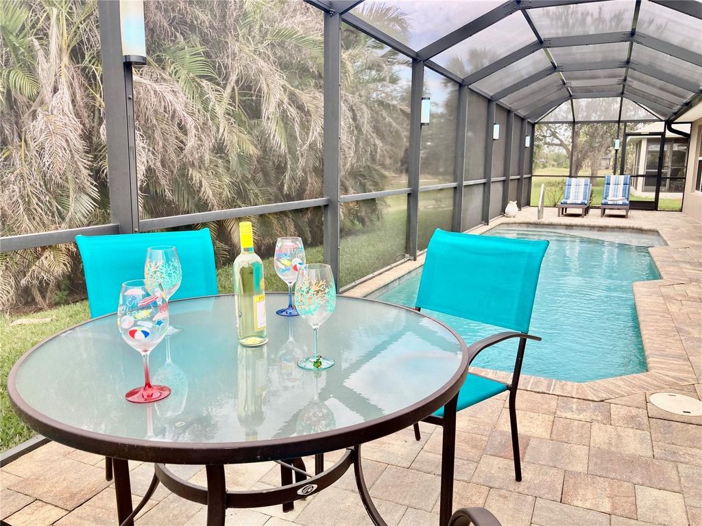 Photo of 87 Long Meadow Lane, Rotonda West, FL 33947 (MLS # A4680771)