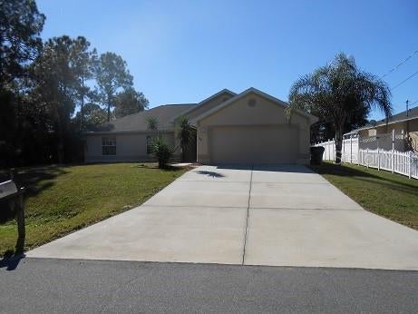 Photo of 1871 Calahan Avenue, North Port, FL 34288 (MLS # C7526909)