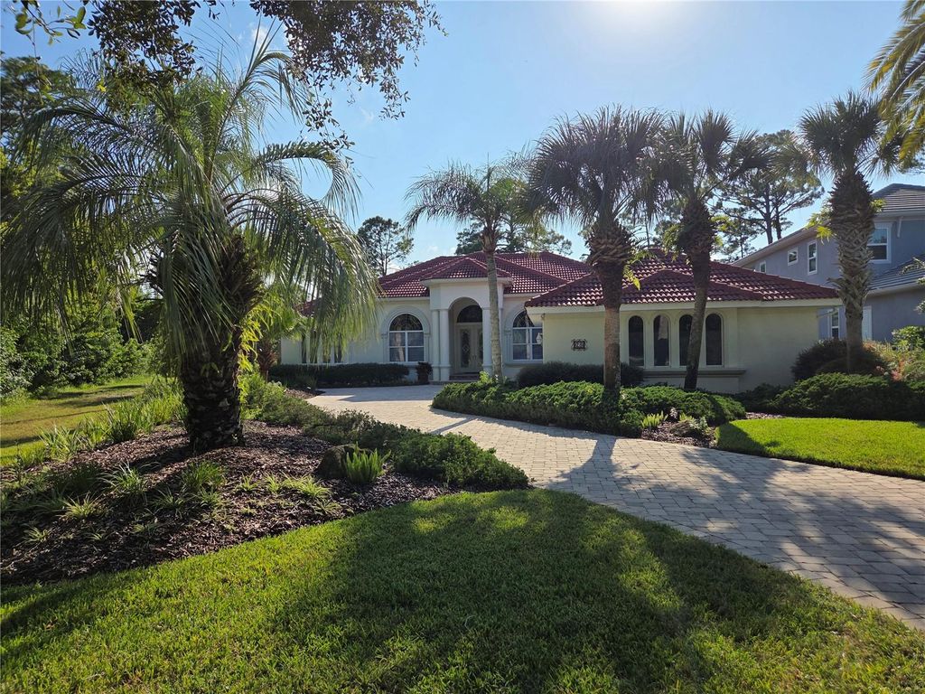 Photo of 28 Chinier Street, Palm Coast, FL 32137 (MLS # FC312780)